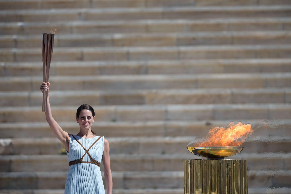 Зажжение олимпийского факела Греция