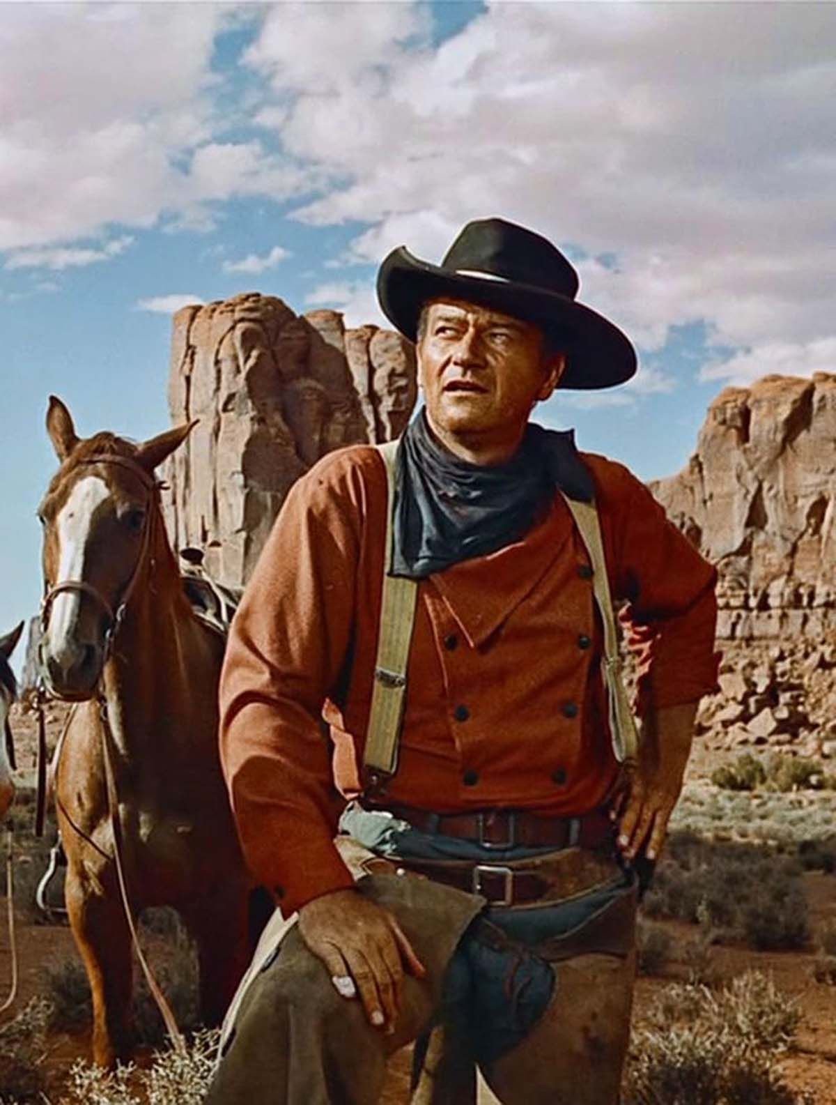 Как называется ковбойская песня. John Wayne. John Wayne Western. Джон Уэйн и Клинт Иствуд. John Wayne Cowboy.